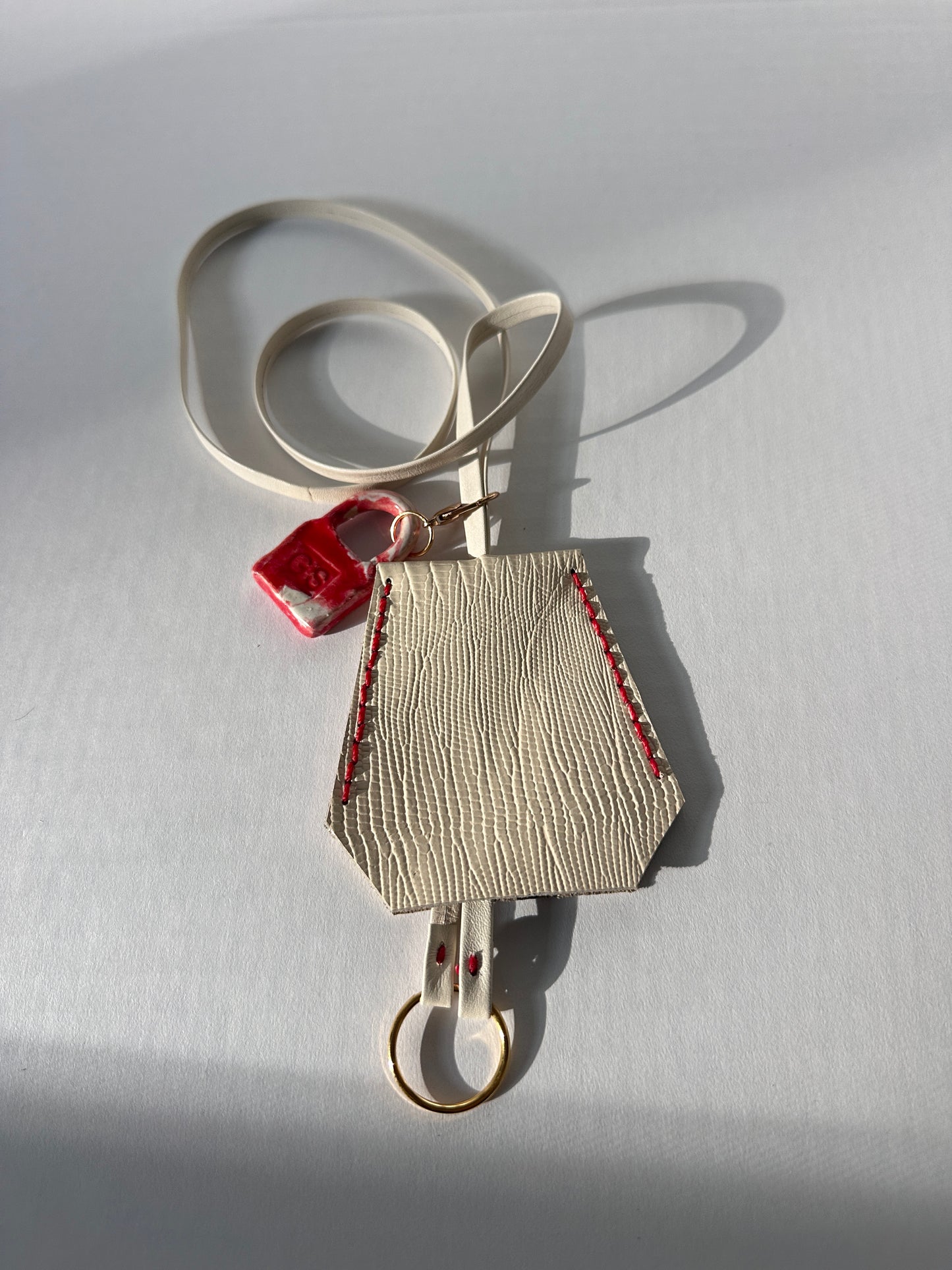 “Alice’s World” Leather Clochette with ceramic padlock