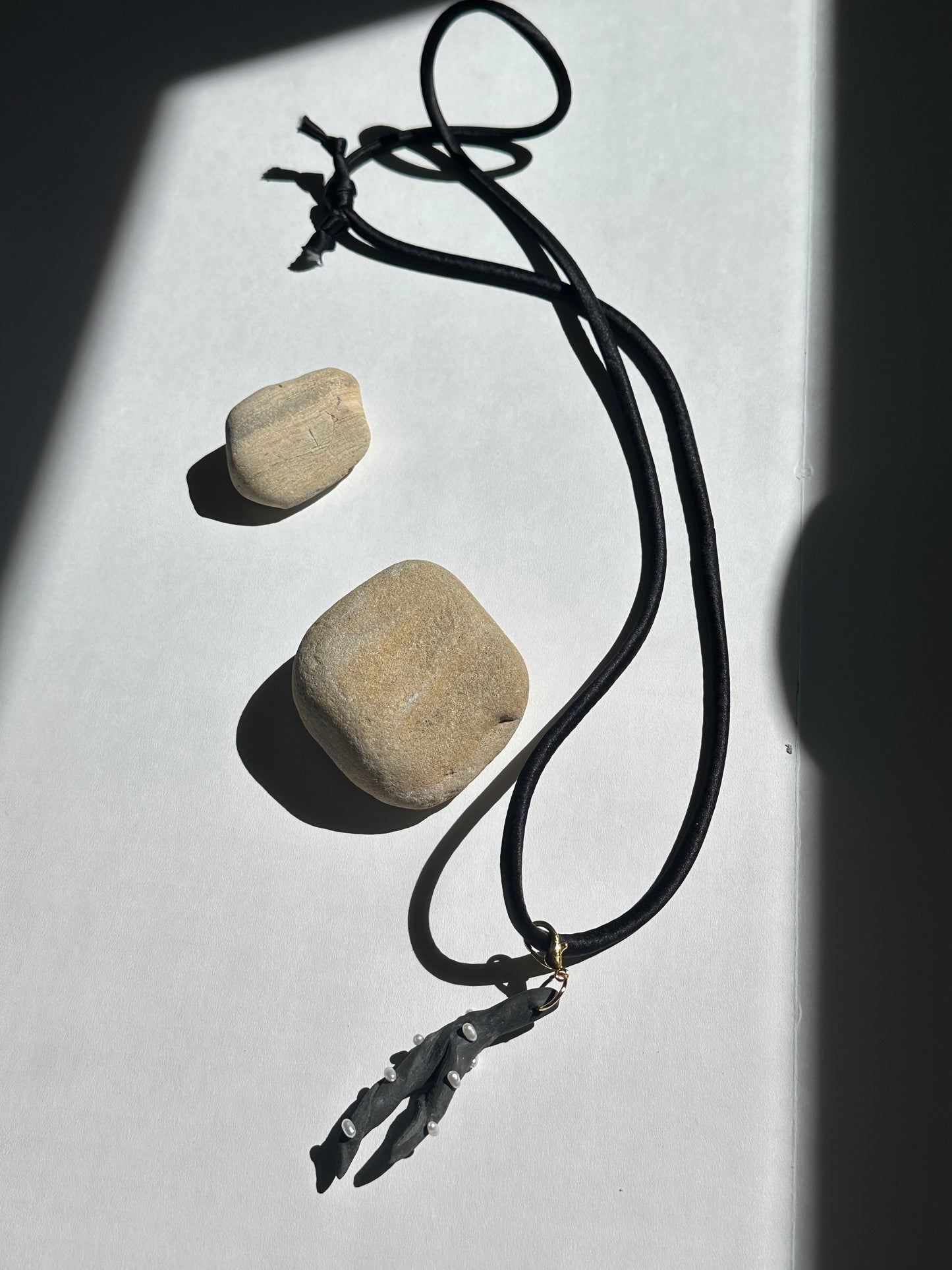 Pearl-Studded Dark Ceramic Driftwood Pendant on Black Silk Cord