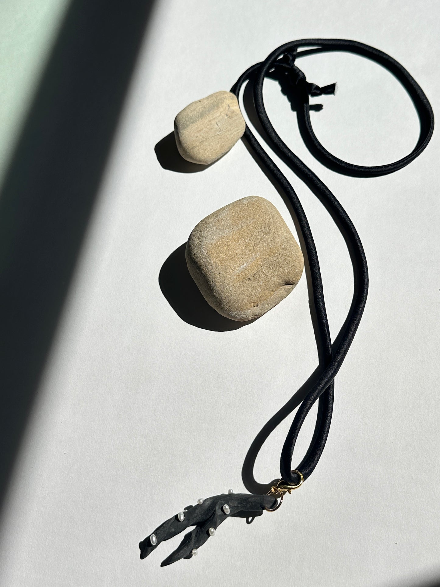 Pearl-Studded Dark Ceramic Driftwood Pendant on Black Silk Cord