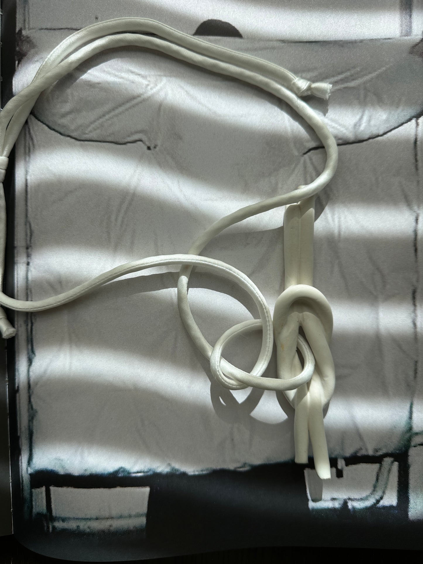 Ceramic Knot Pendant with Off White Silk Cord
