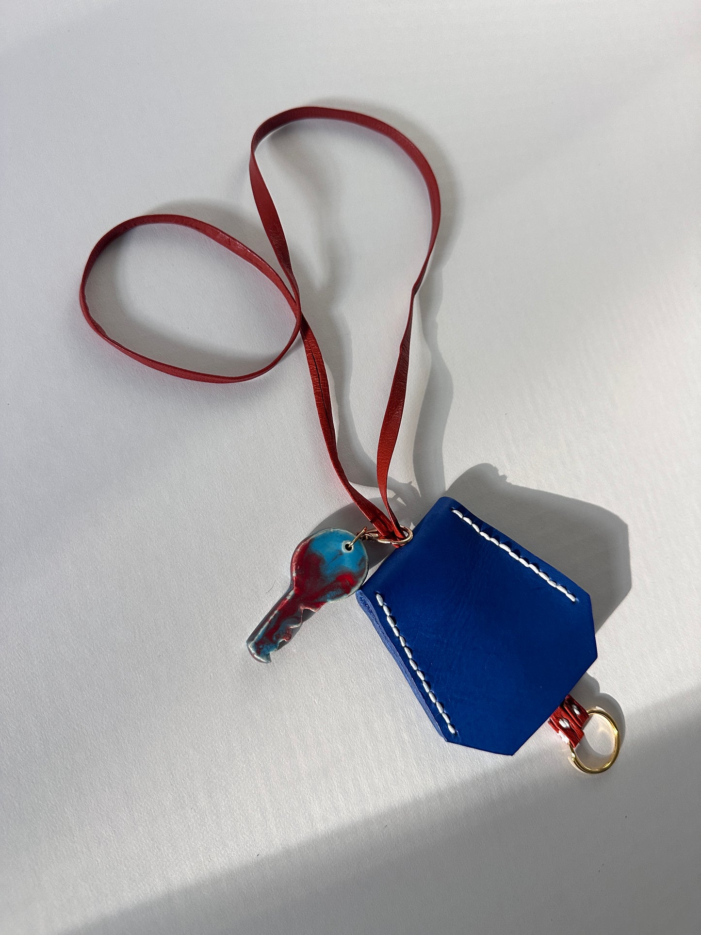 “Alice’s World” Leather Clochette with ceramic key