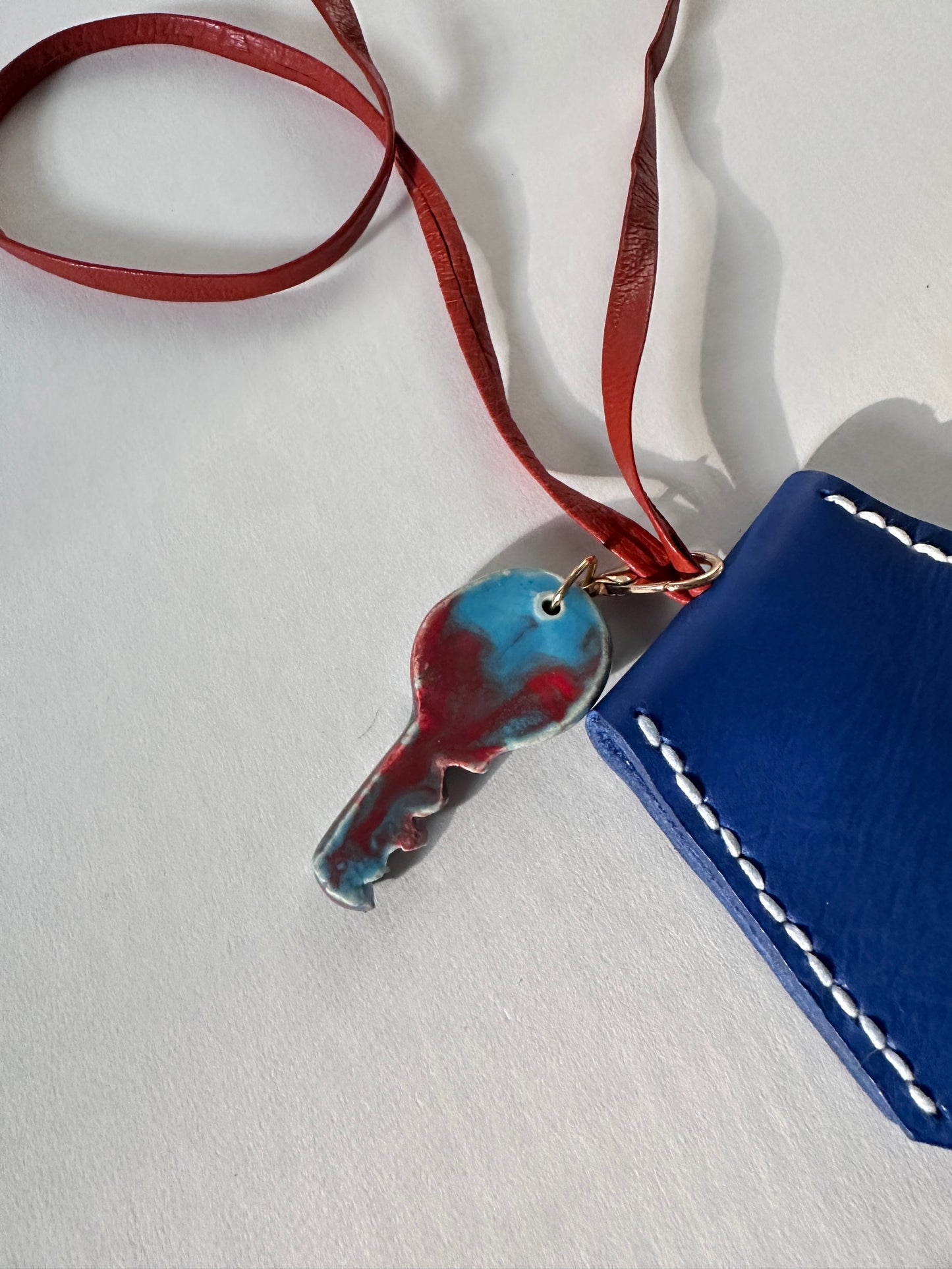 “Alice’s World” Leather Clochette with ceramic key