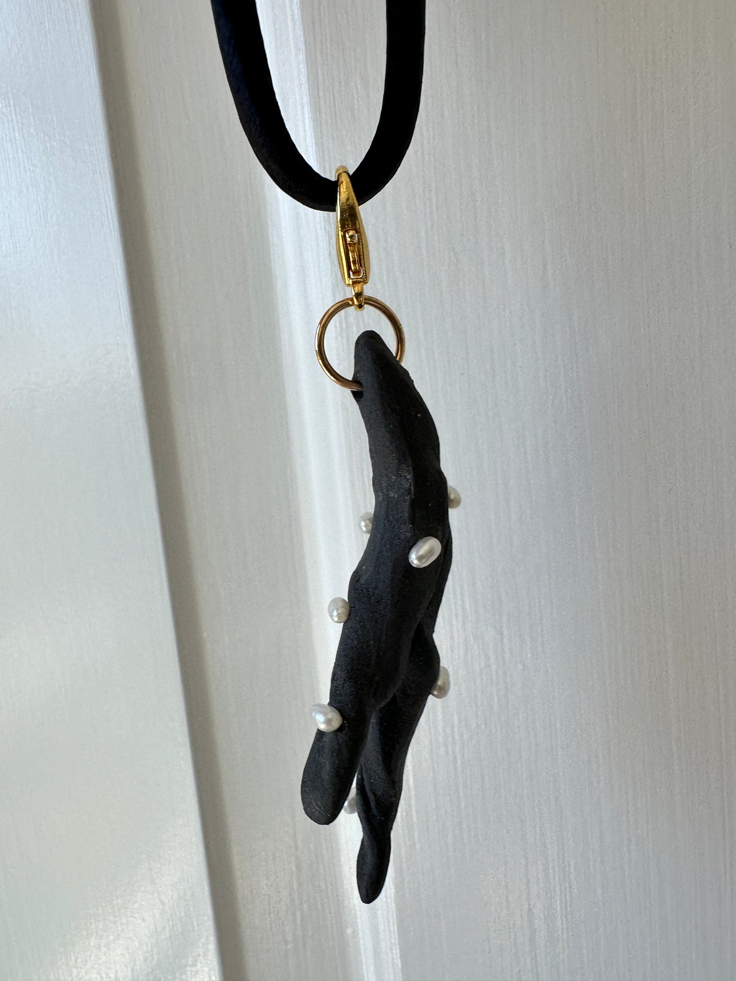 Pearl-Studded Dark Ceramic Driftwood Pendant on Black Silk Cord