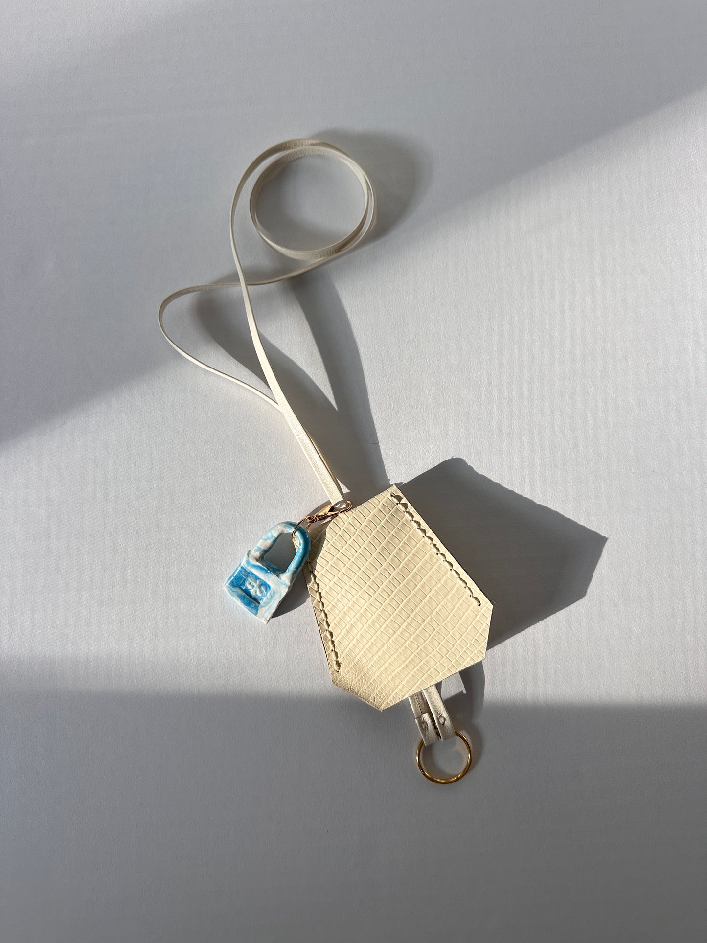 “Alice’s World” Leather Clochette with ceramic padlock