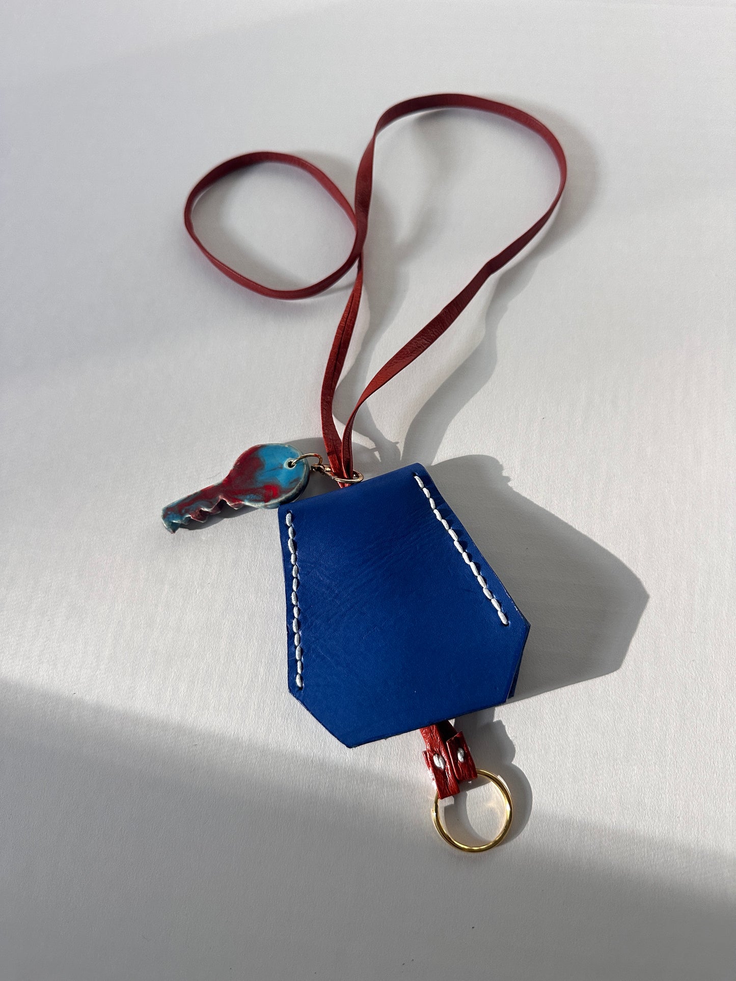 “Alice’s World” Leather Clochette with ceramic key