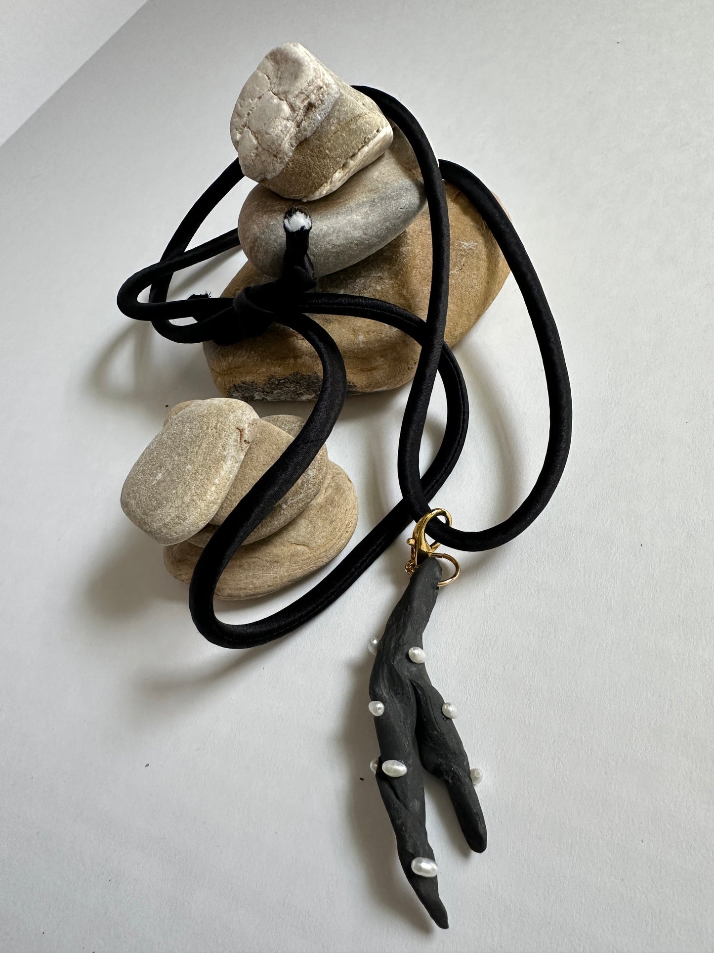 Pearl-Studded Dark Ceramic Driftwood Pendant on Black Silk Cord
