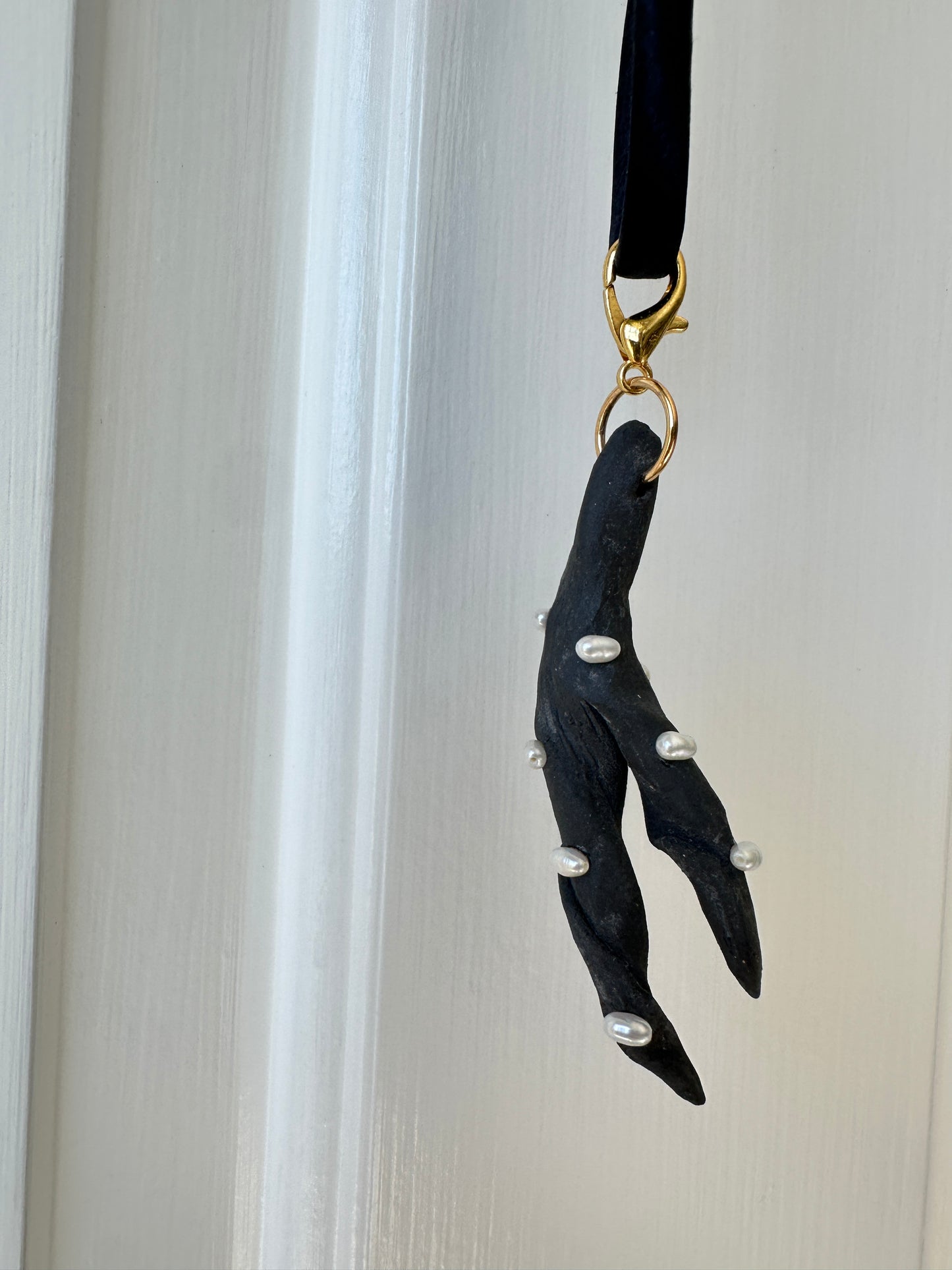 Pearl-Studded Dark Ceramic Driftwood Pendant on Black Silk Cord