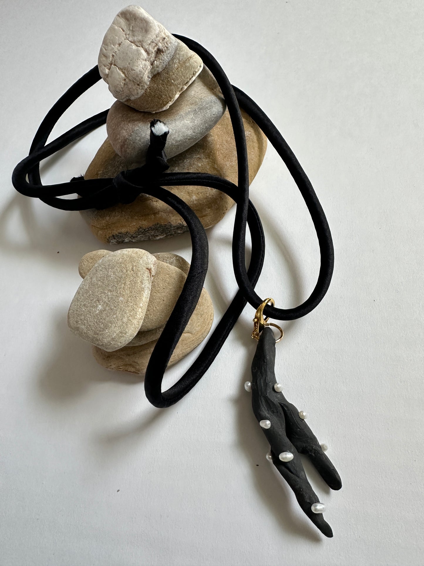 Pearl-Studded Dark Ceramic Driftwood Pendant on Black Silk Cord
