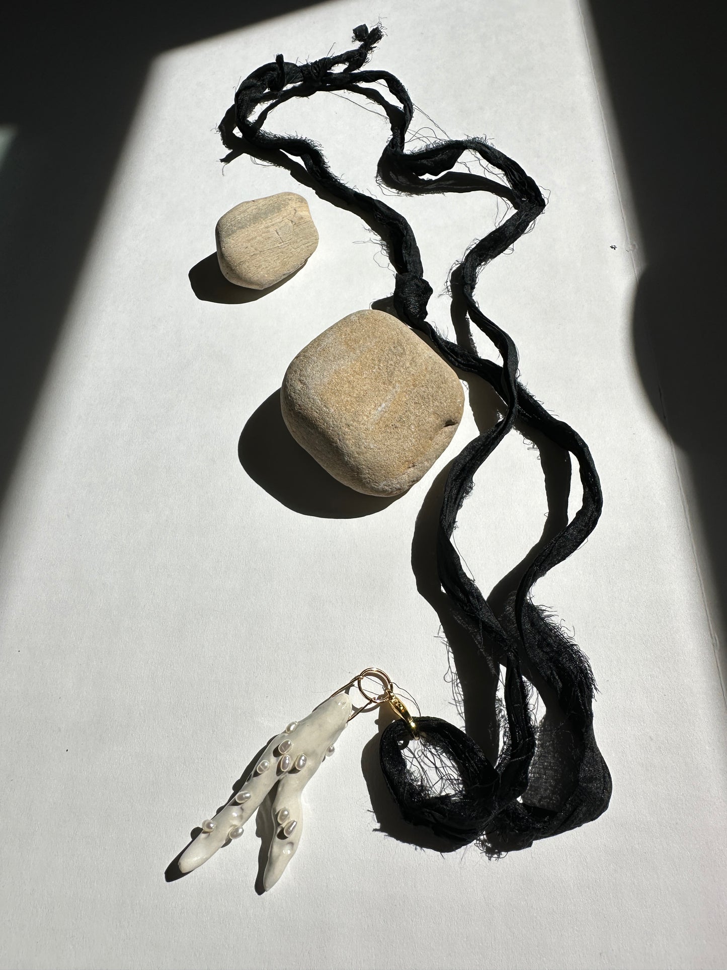 Pearl-Studded Ceramic Driftwood Pendant on Raw Silk Cord