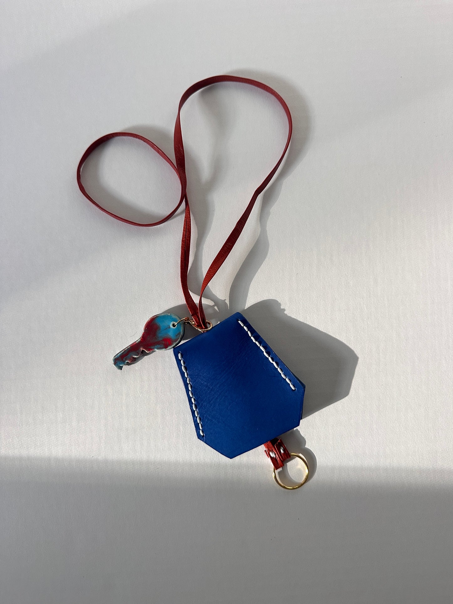 “Alice’s World” Leather Clochette with ceramic key