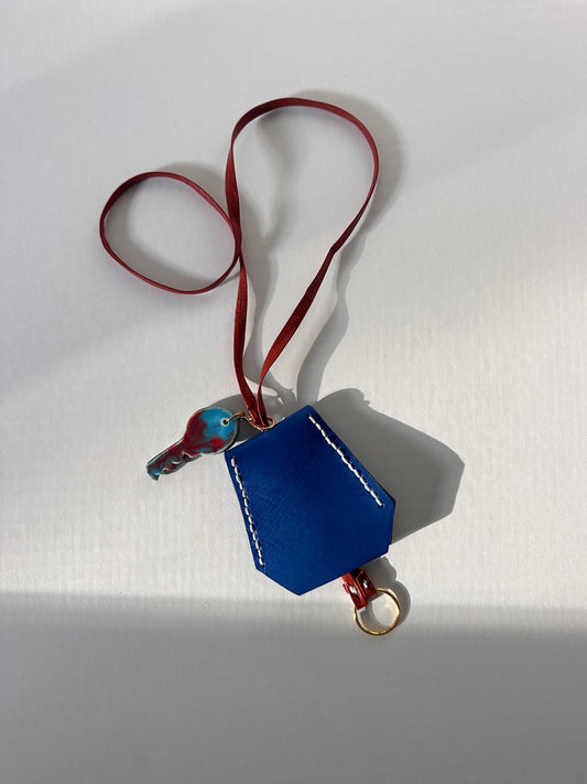 “Alice’s World” Leather Clochette with ceramic key