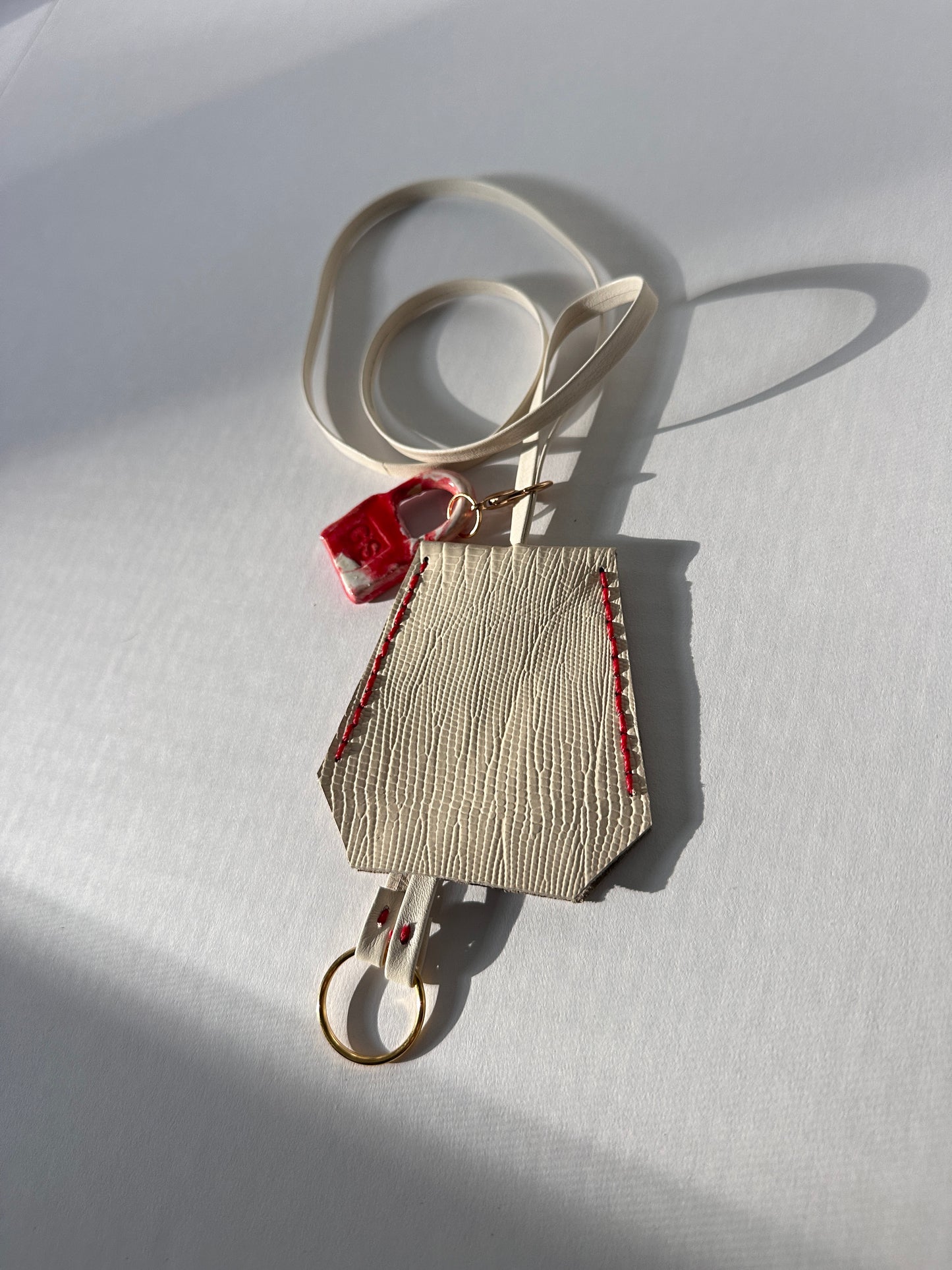 “Alice’s World” Leather Clochette with ceramic padlock