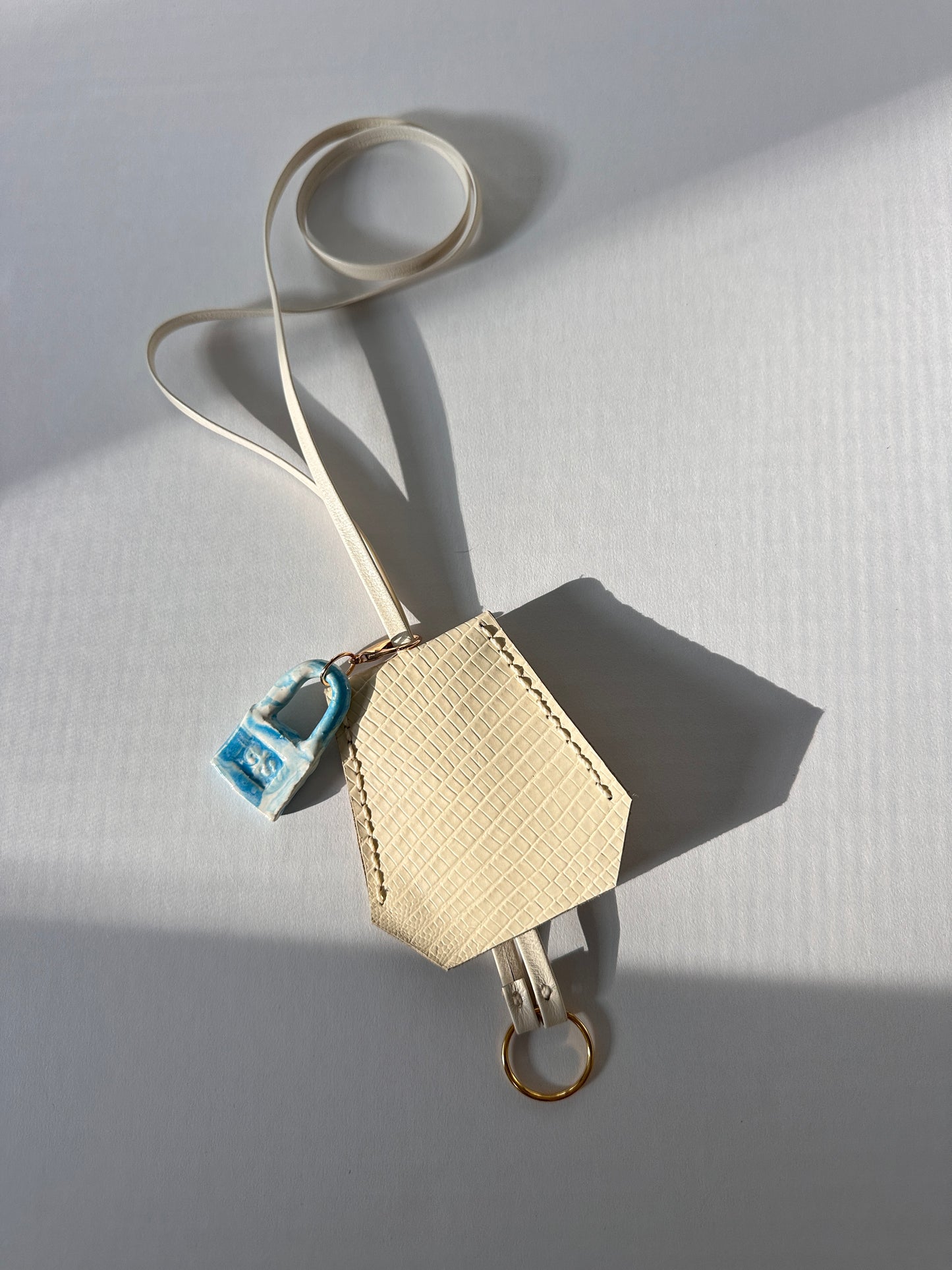 “Alice’s World” Leather Clochette with ceramic padlock