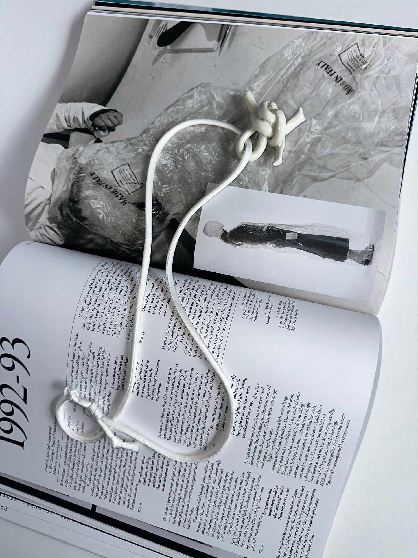 Ceramic knot pendant with silk cord in white