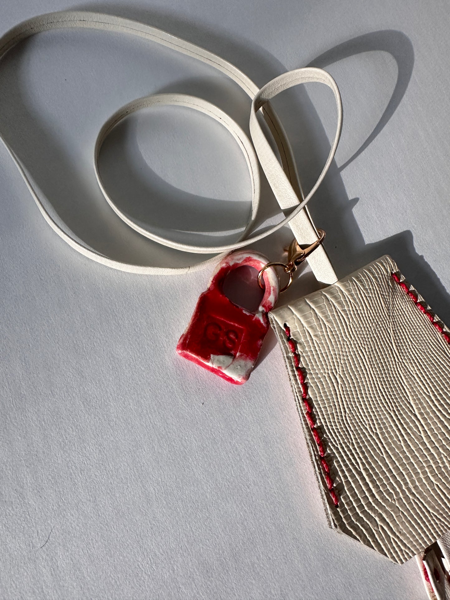 “Alice’s World” Leather Clochette with ceramic padlock