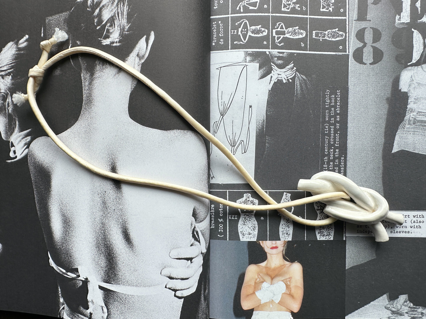 Ceramic knot pendant with ivory silk cord