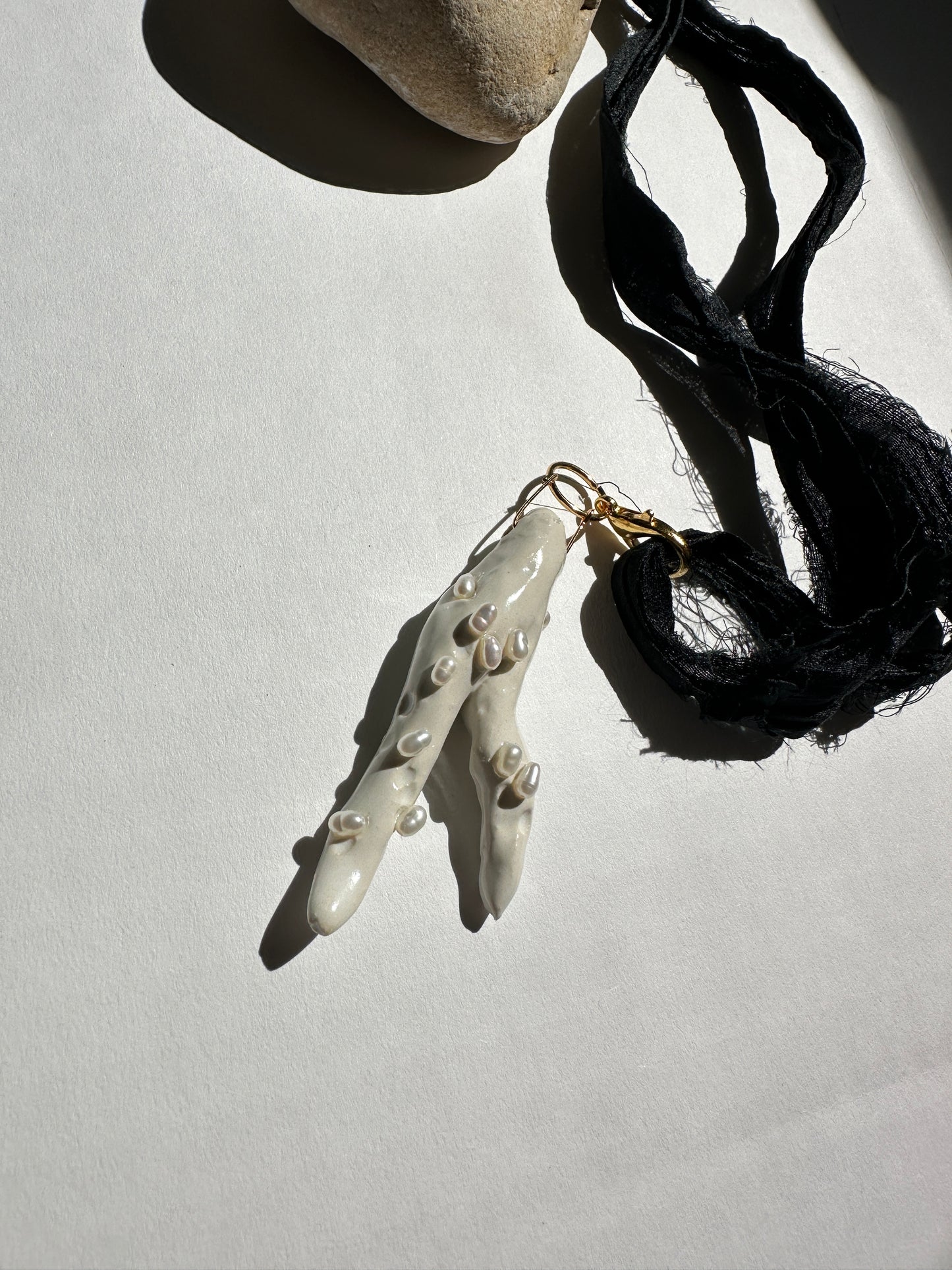 Pearl-Studded Ceramic Driftwood Pendant on Raw Silk Cord