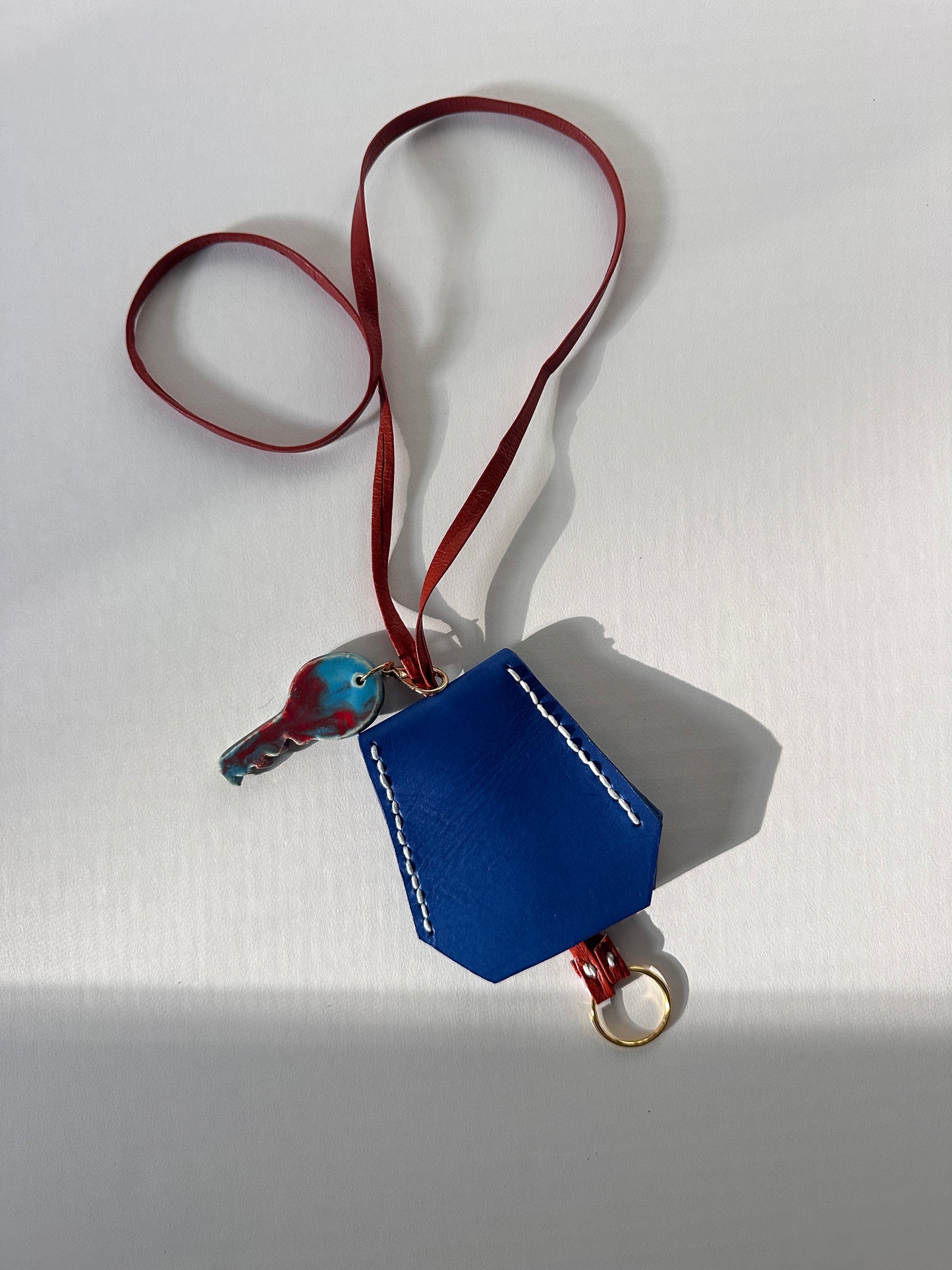 “Alice’s World” Leather Clochette with ceramic key