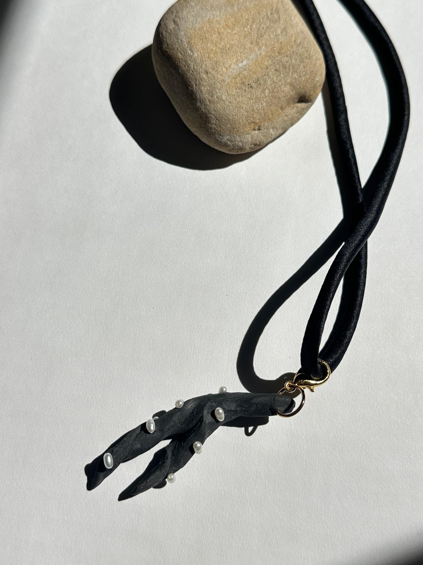 Pearl-Studded Dark Ceramic Driftwood Pendant on Black Silk Cord