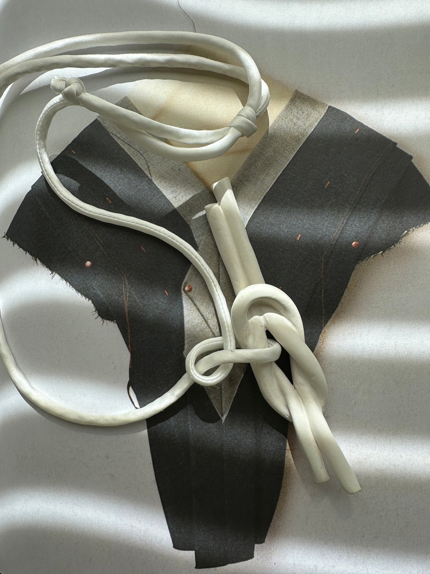 Ceramic Knot Pendant with Off White Silk Cord