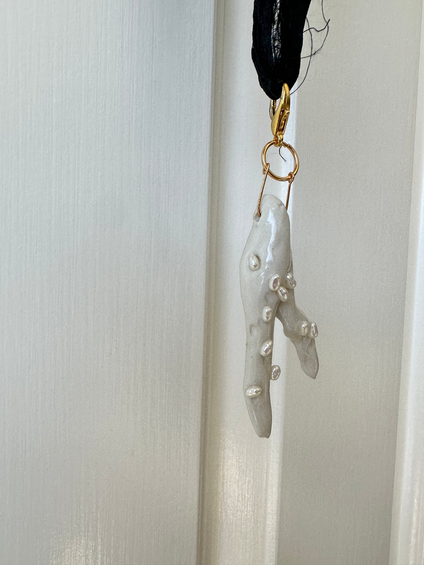 Pearl-Studded Ceramic Driftwood Pendant on Raw Silk Cord