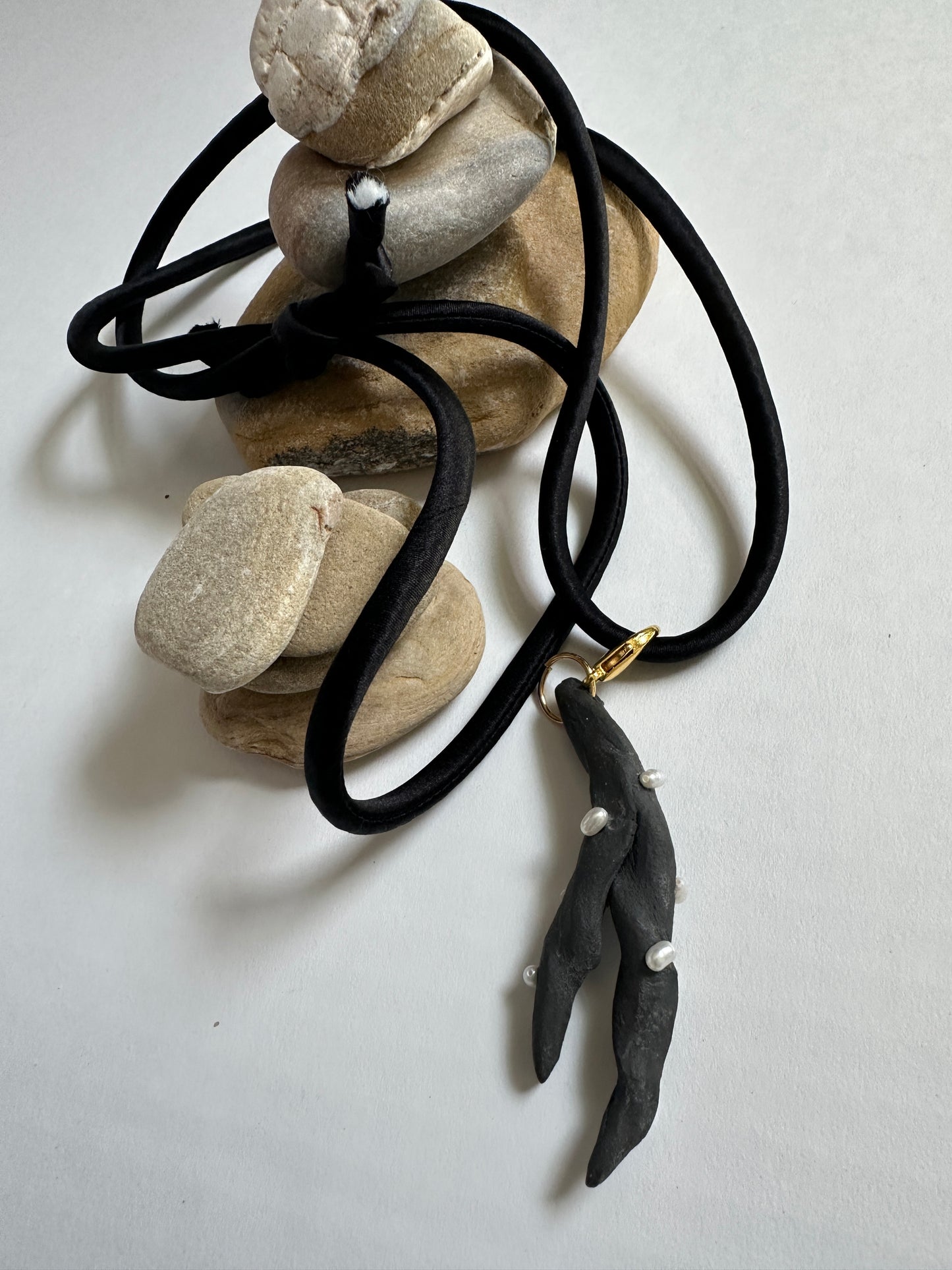 Pearl-Studded Dark Ceramic Driftwood Pendant on Black Silk Cord
