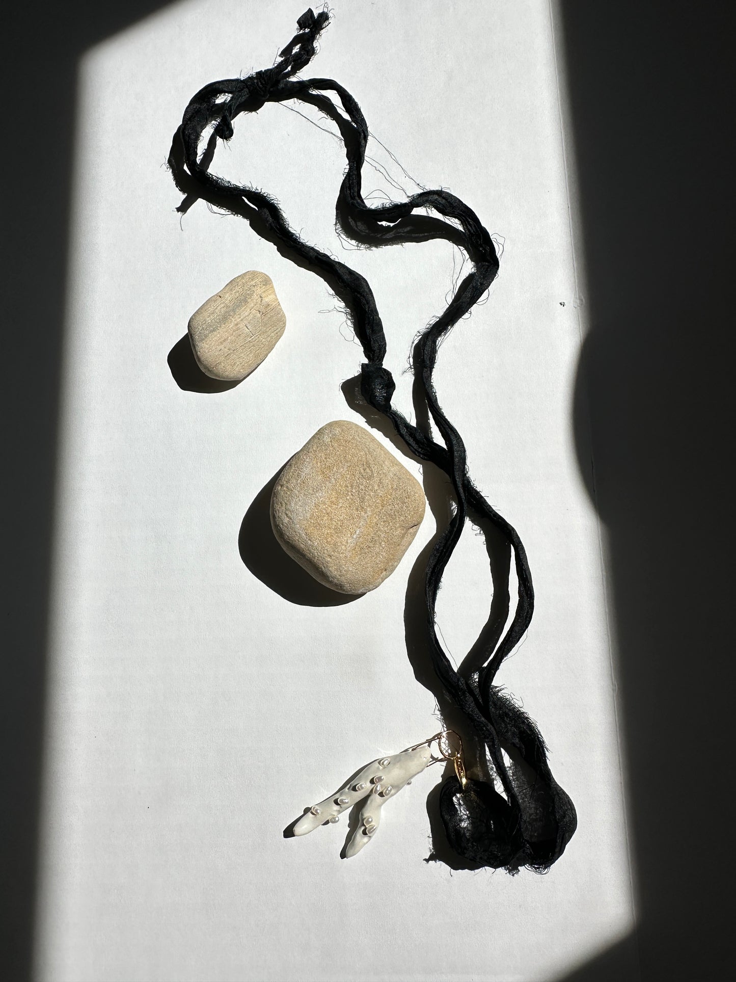 Pearl-Studded Ceramic Driftwood Pendant on Raw Silk Cord