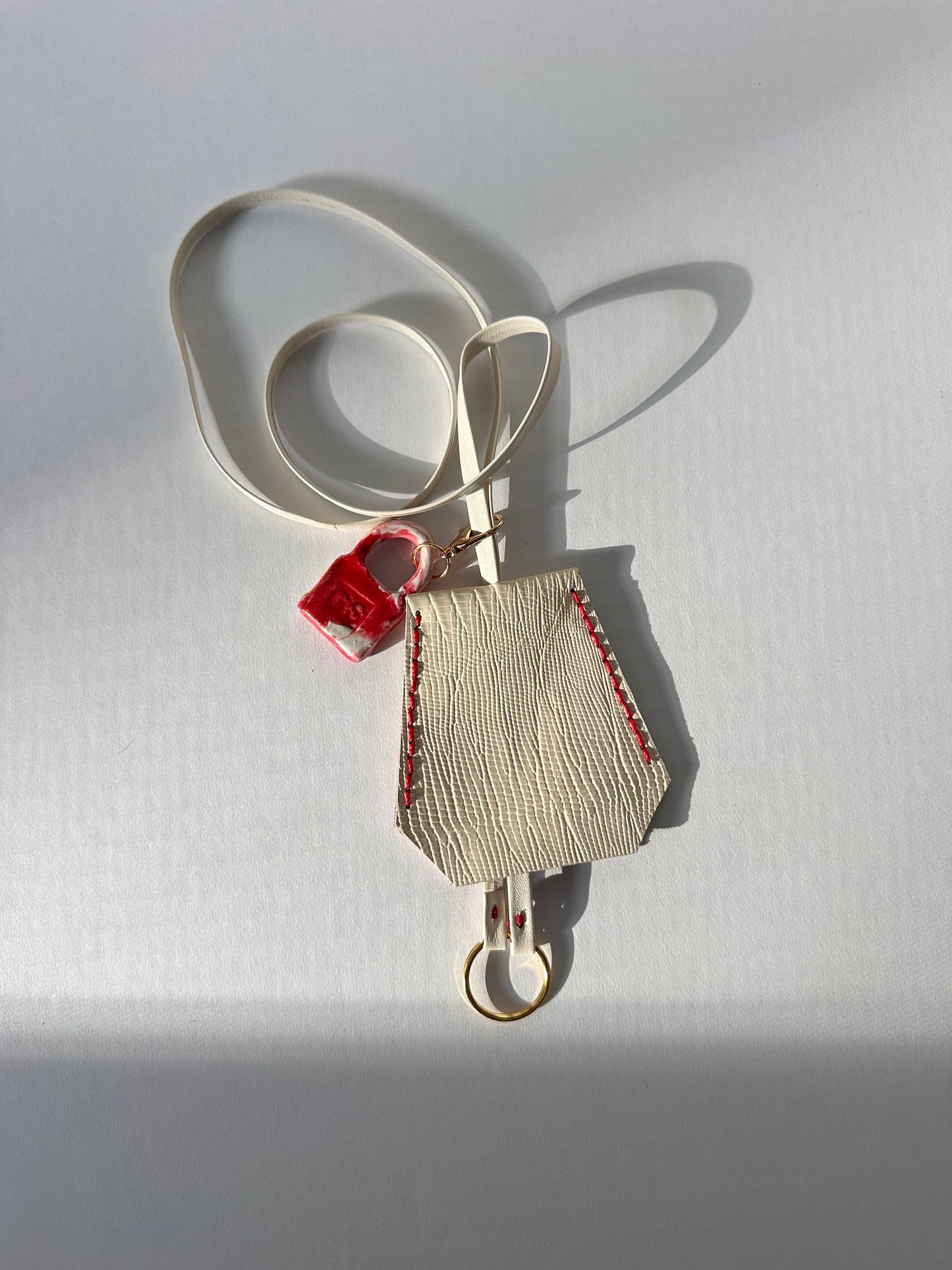 “Alice’s World” Leather Clochette with ceramic padlock