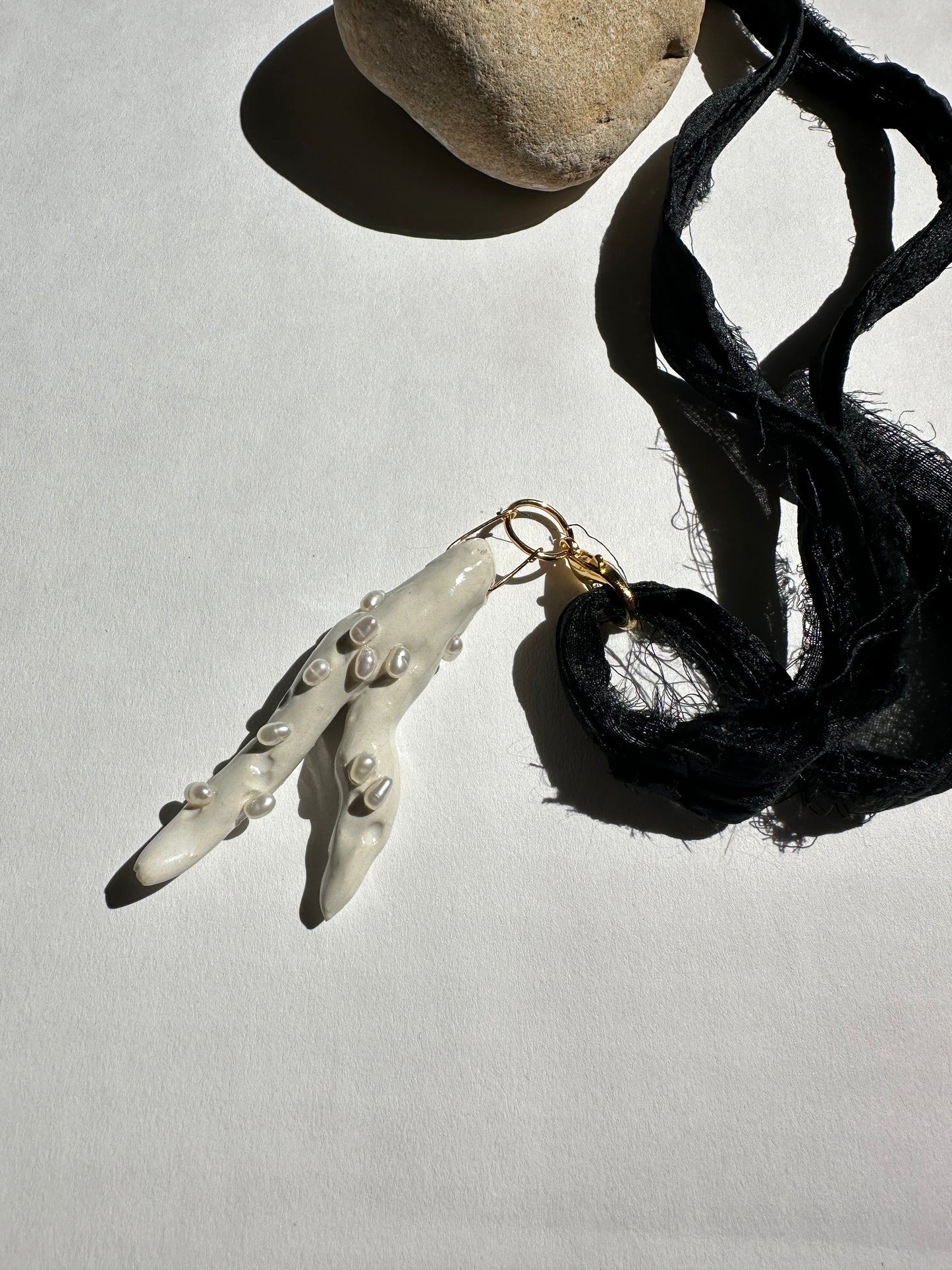 Pearl-Studded Ceramic Driftwood Pendant on Raw Silk Cord
