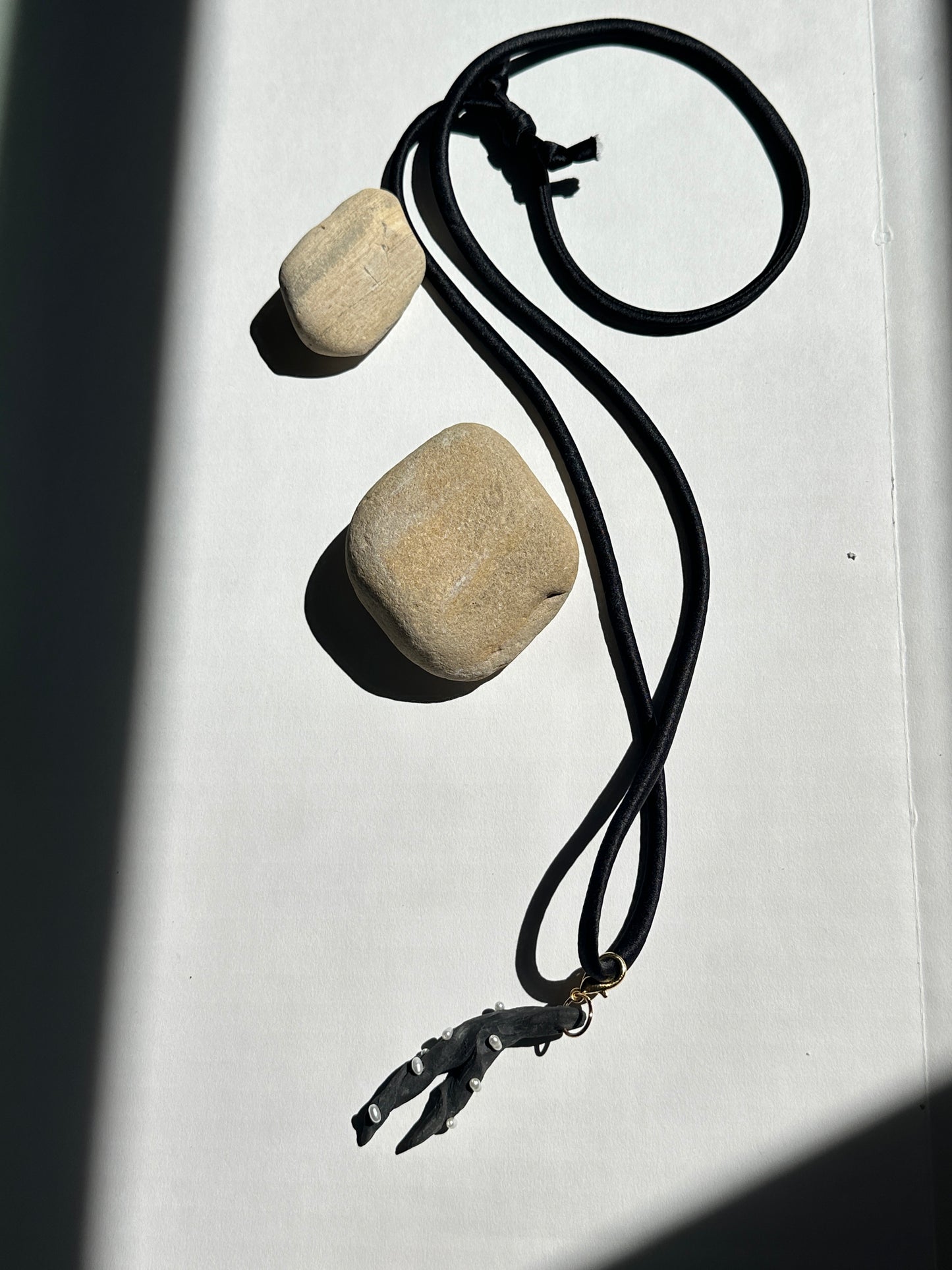 Pearl-Studded Dark Ceramic Driftwood Pendant on Black Silk Cord