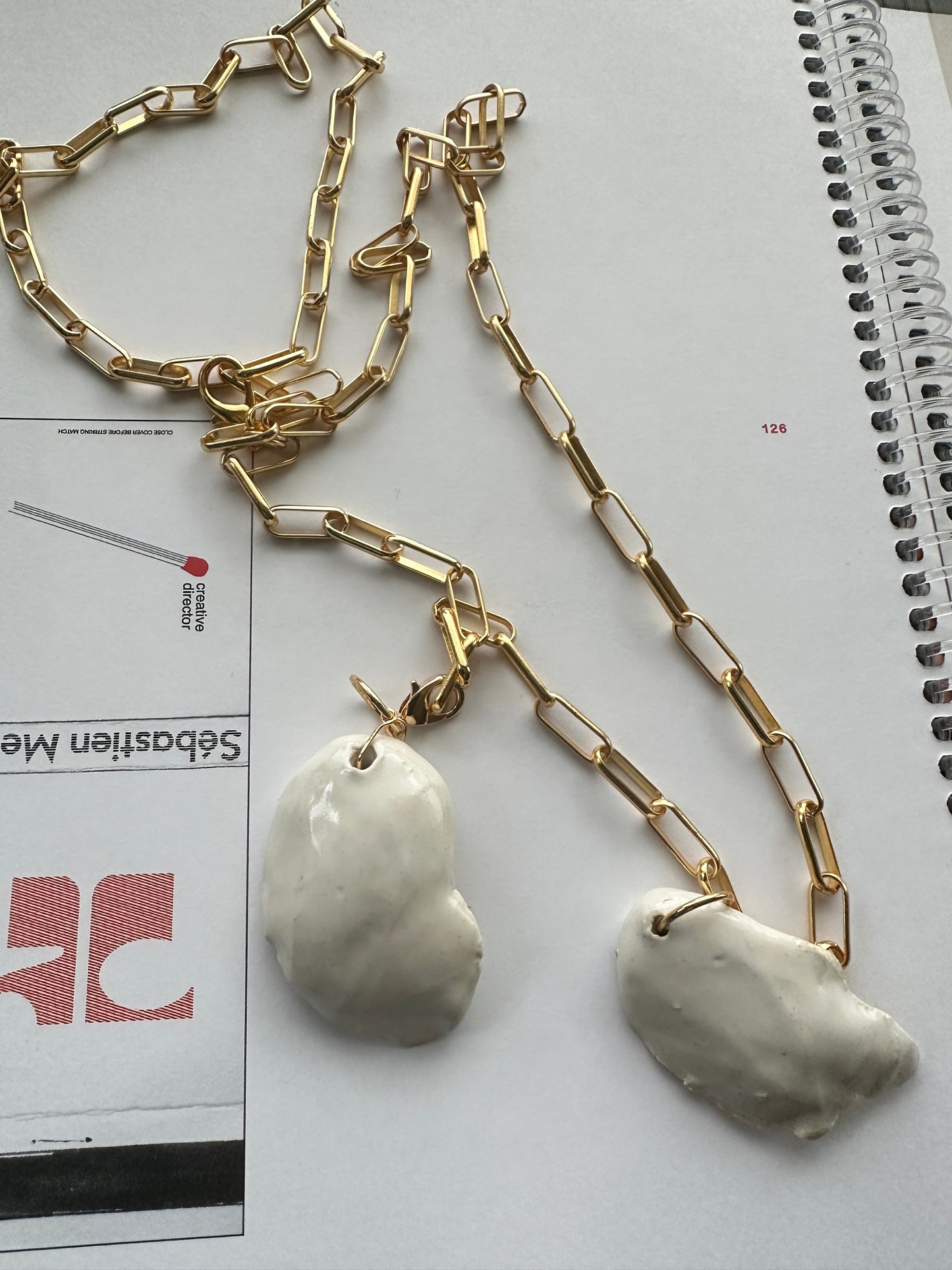 “Walking On Eggshells” ceramic pendant necklace