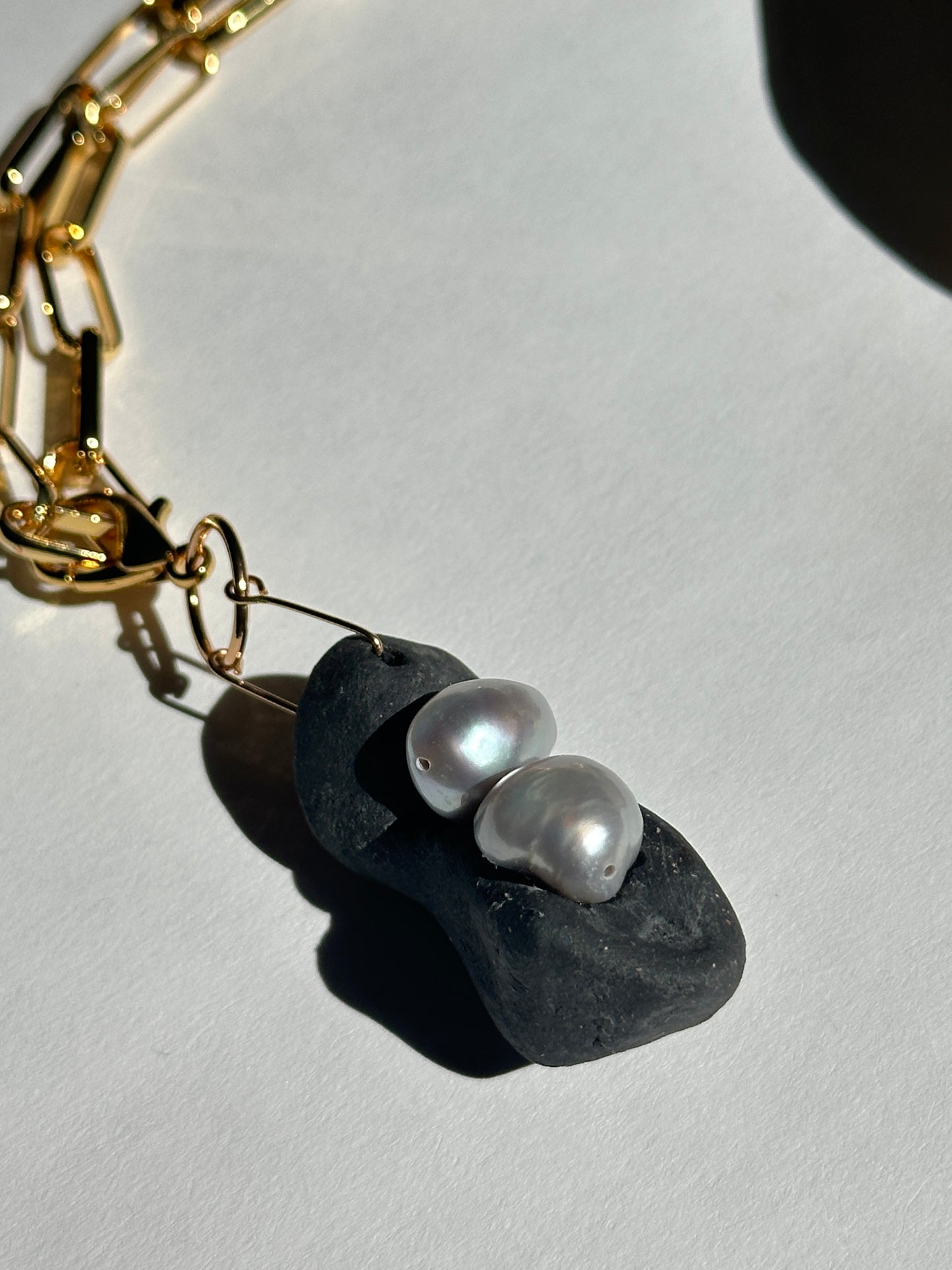 Black Ceramic Form & Baroque Pearl Pendant on Gold Paperclip Chain