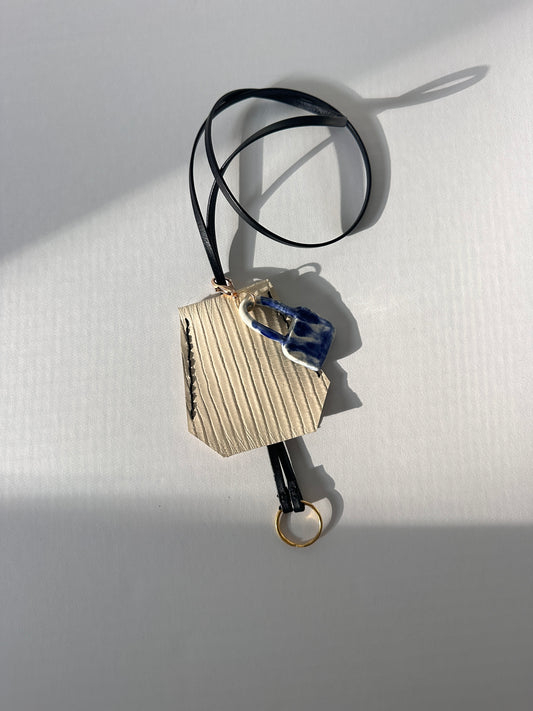 “Alice’s World” Leather Clochette with ceramic padlock