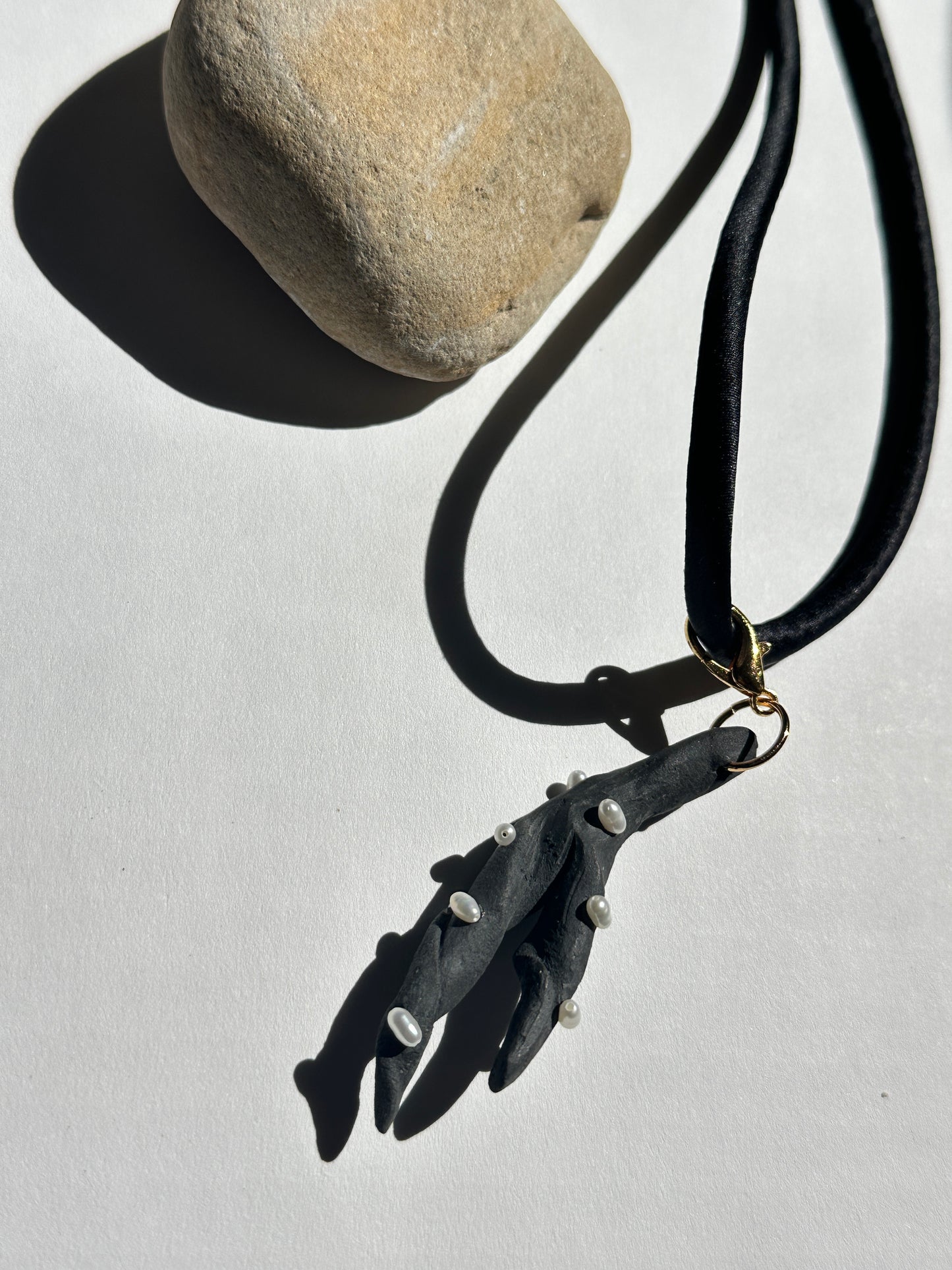 Pearl-Studded Dark Ceramic Driftwood Pendant on Black Silk Cord