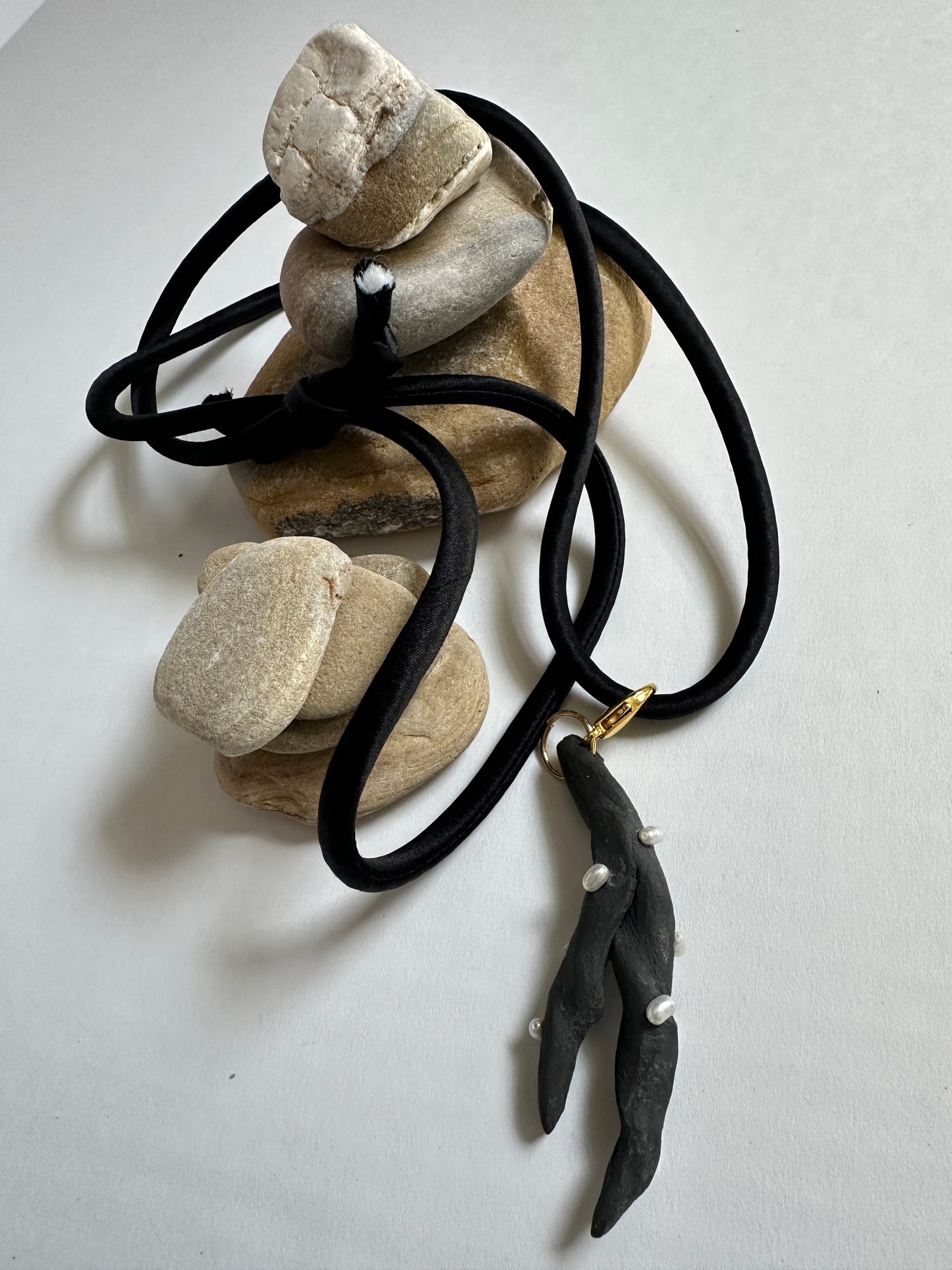 Pearl-Studded Dark Ceramic Driftwood Pendant on Black Silk Cord