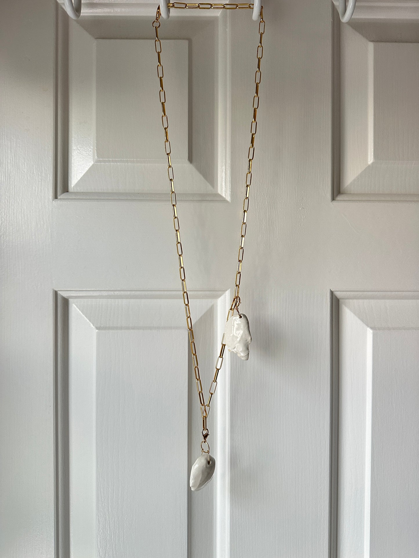 “Walking On Eggshells” ceramic pendant necklace