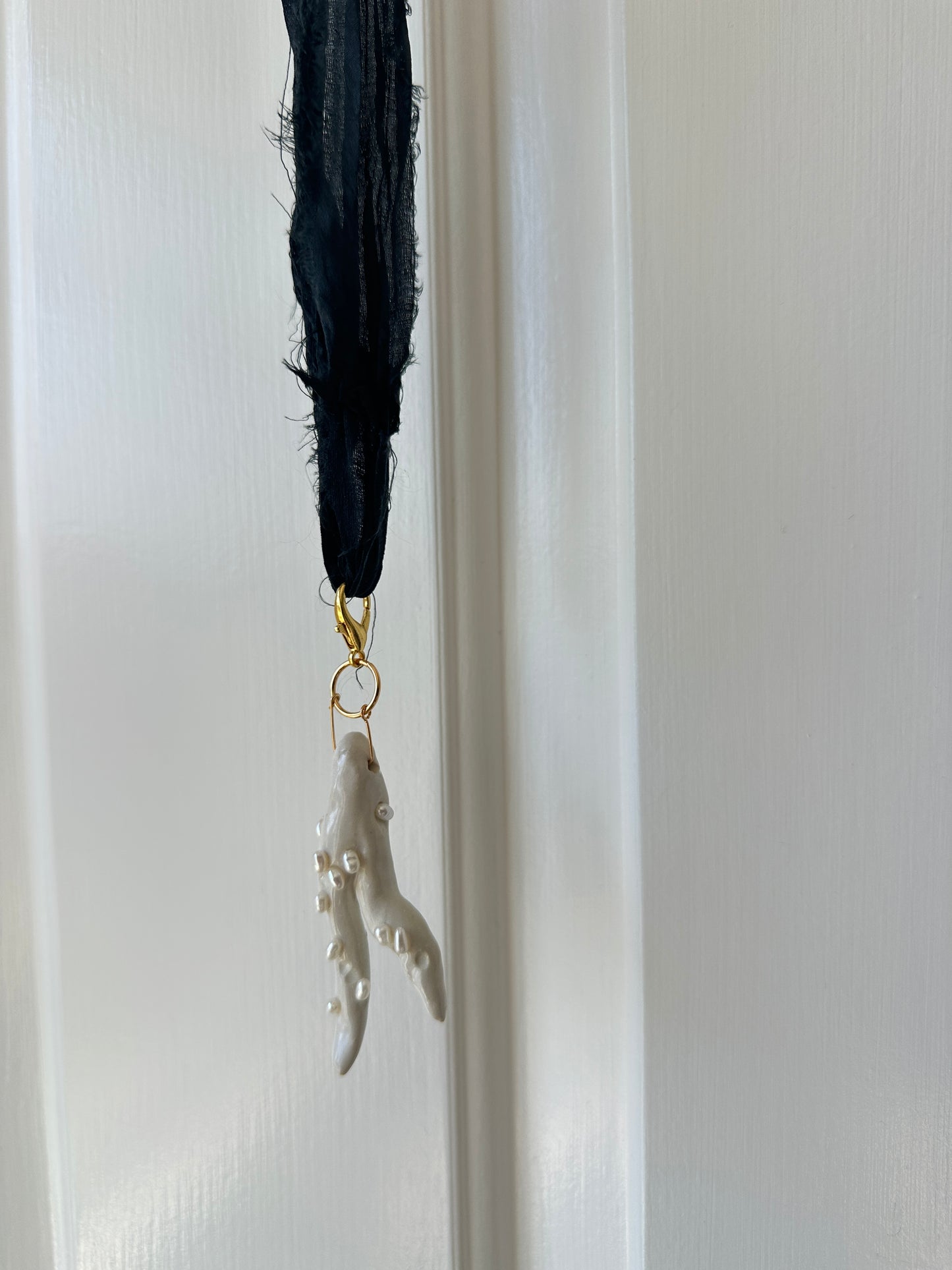 Pearl-Studded Ceramic Driftwood Pendant on Raw Silk Cord