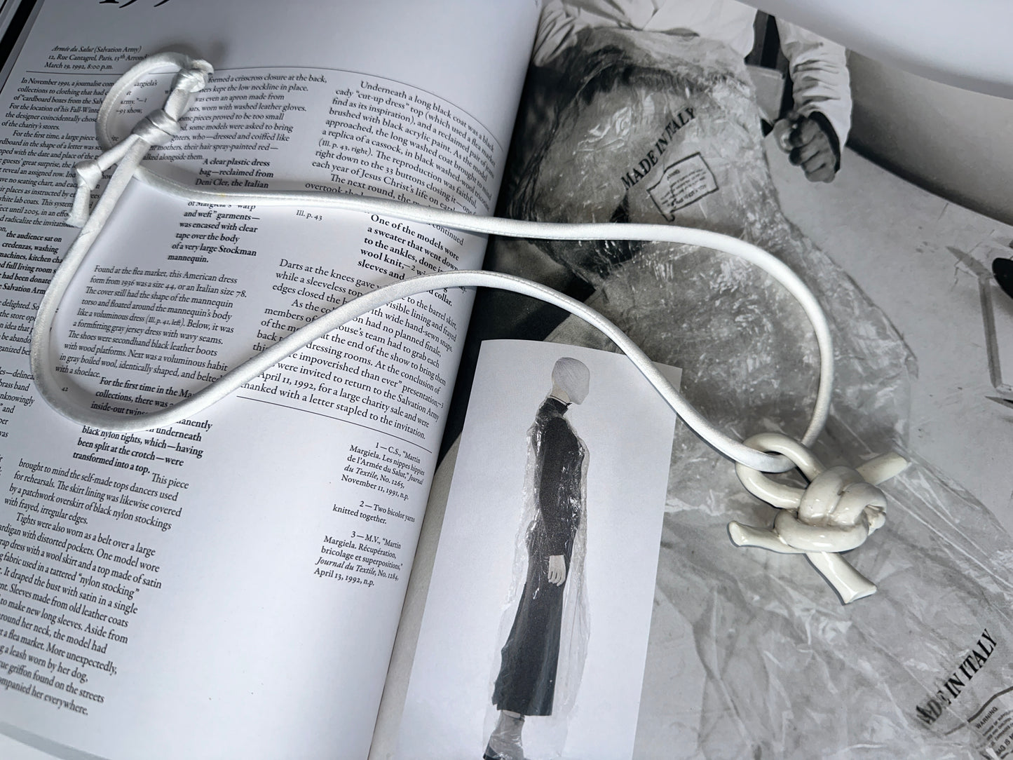 Ceramic knot pendant with silk cord in white
