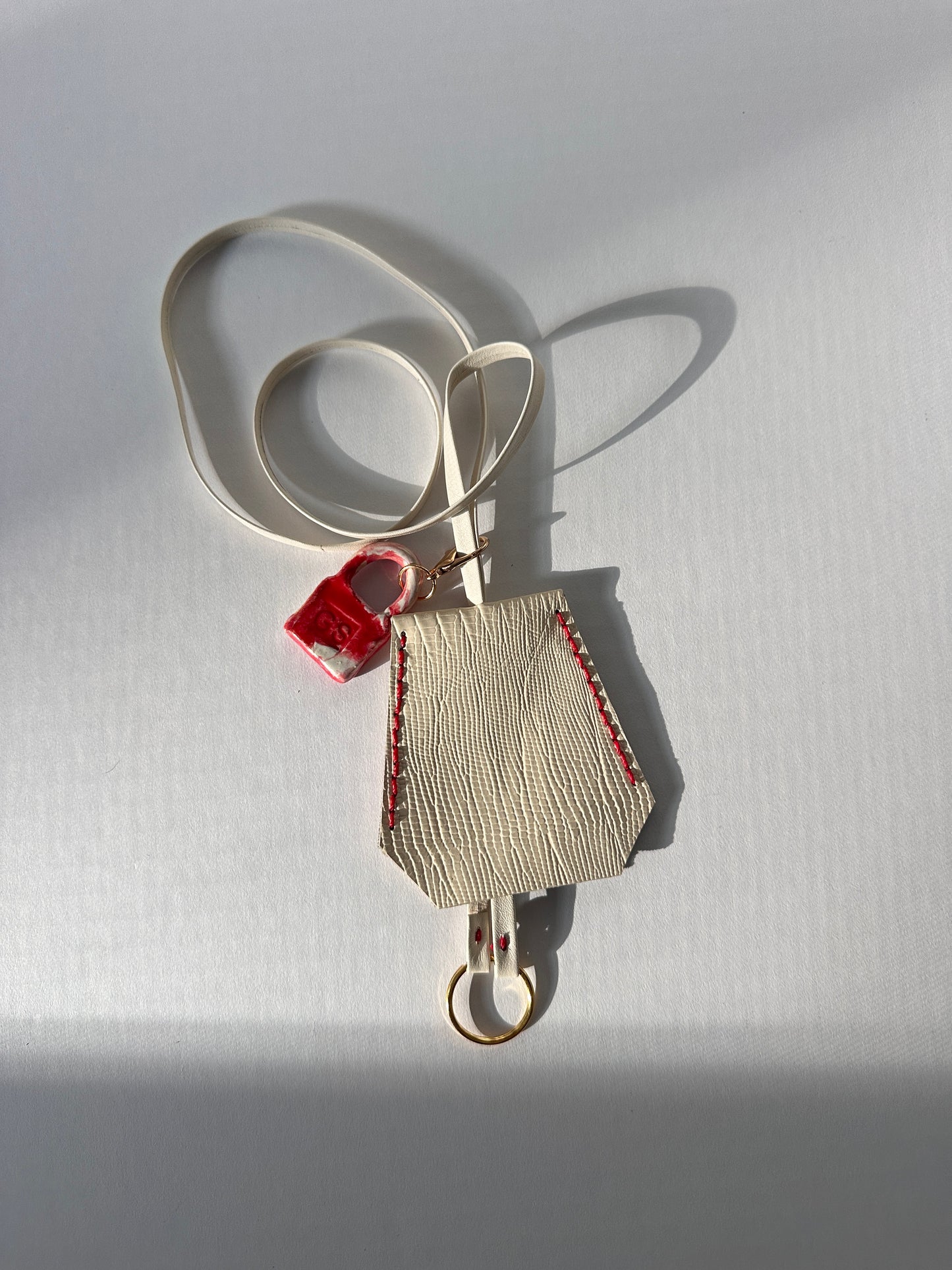 “Alice’s World” Leather Clochette with ceramic padlock