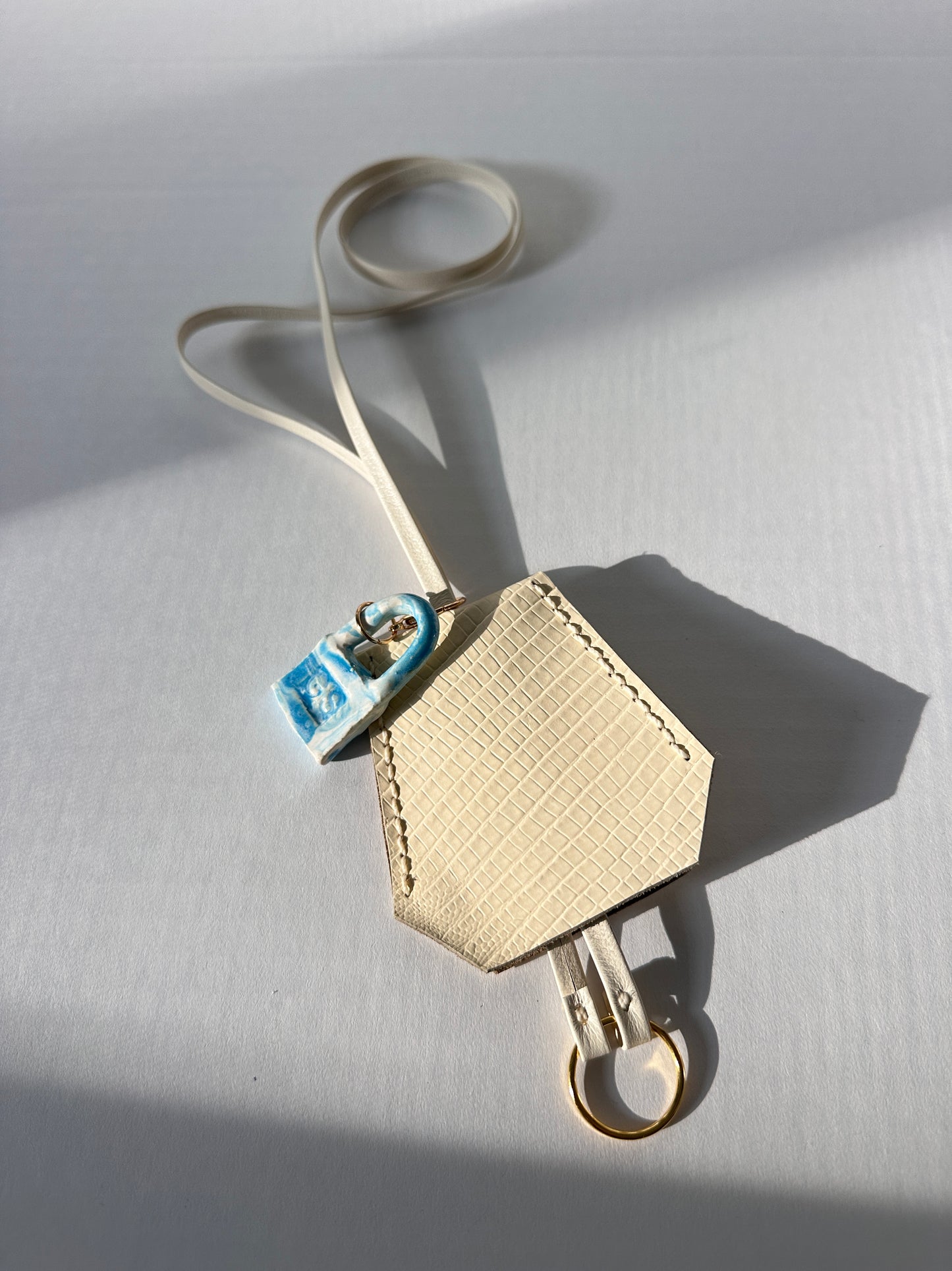 “Alice’s World” Leather Clochette with ceramic padlock