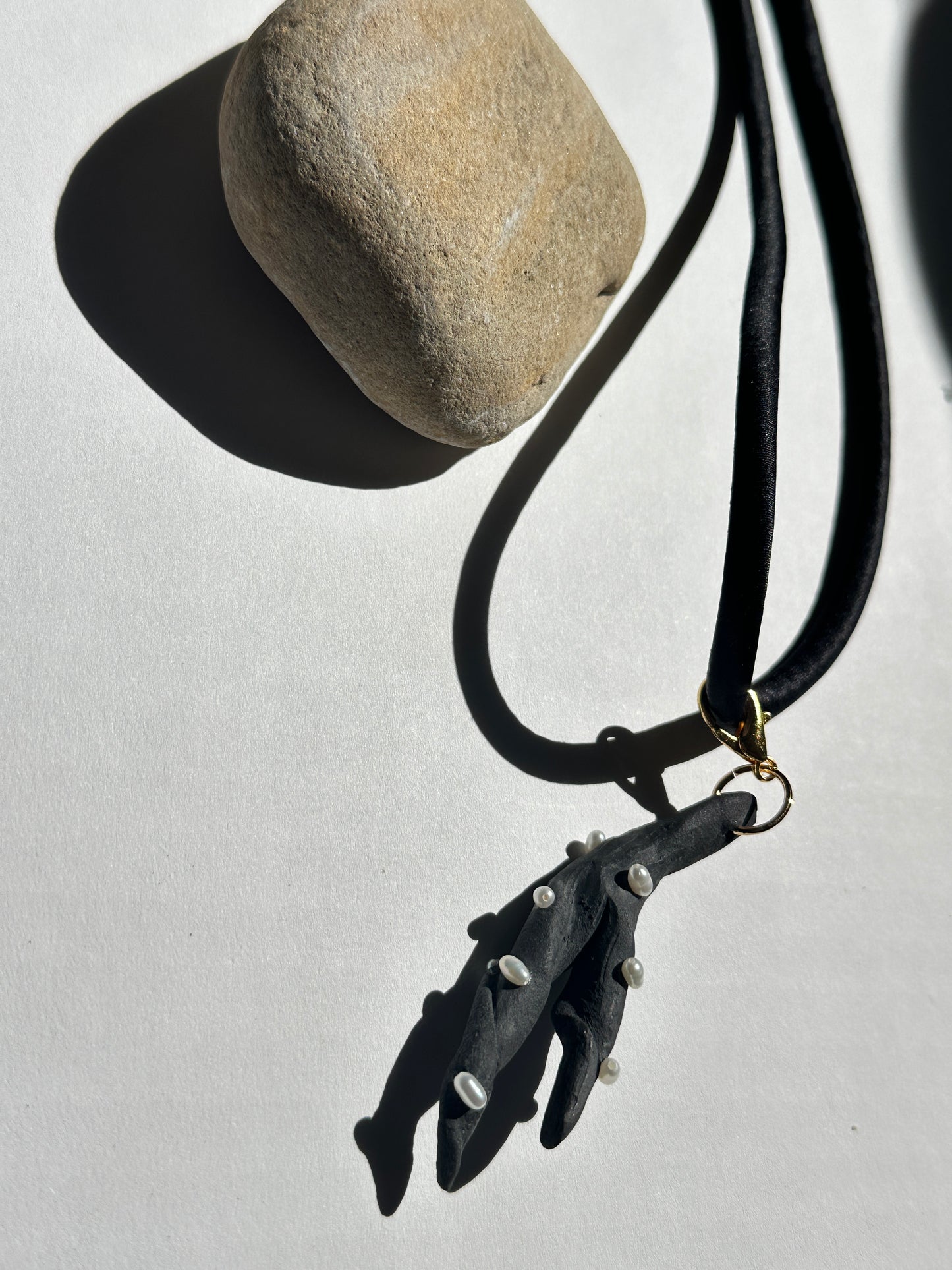 Pearl-Studded Dark Ceramic Driftwood Pendant on Black Silk Cord