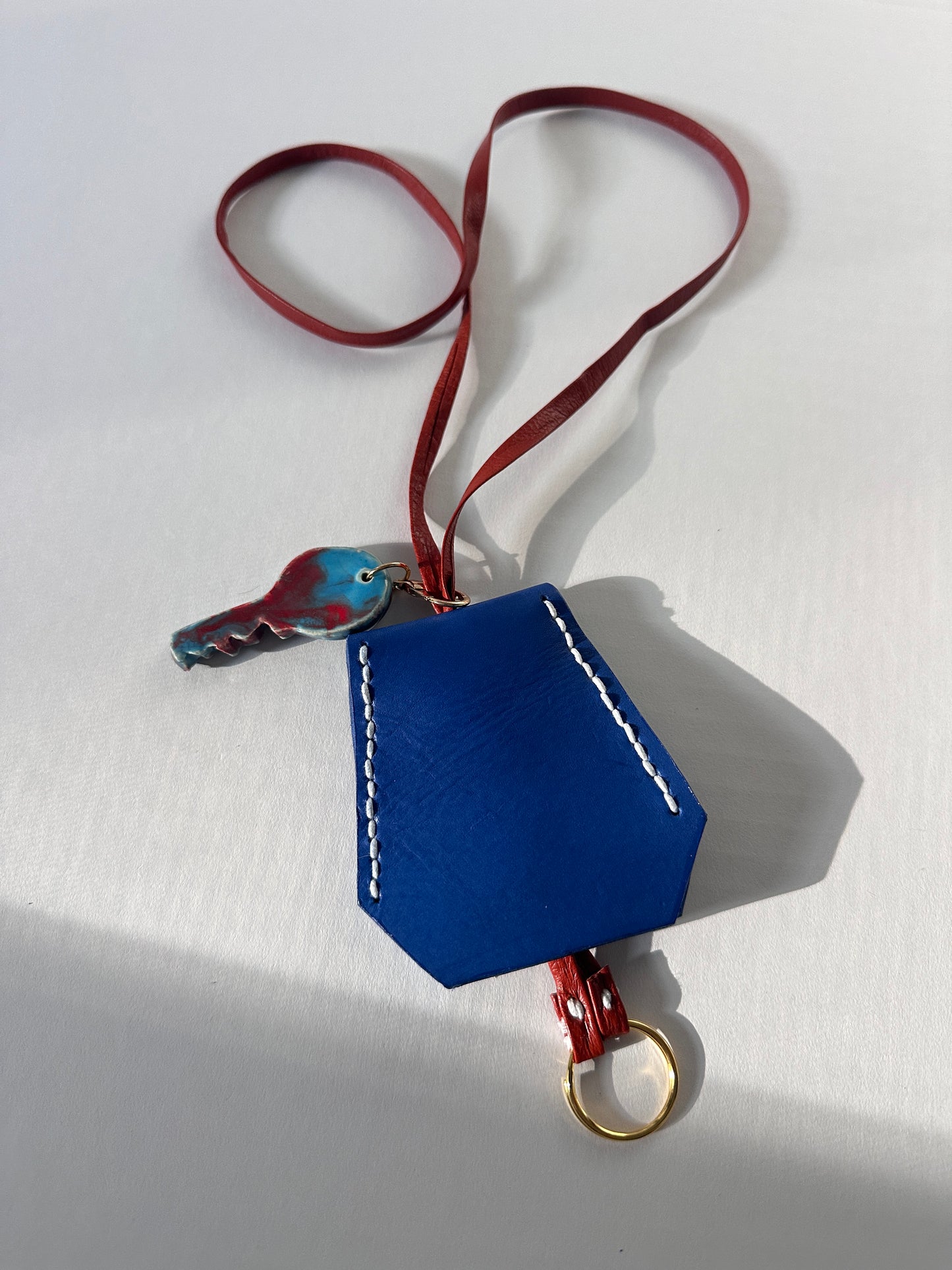 “Alice’s World” Leather Clochette with ceramic key